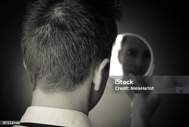 Looking In The Mirror And Reflecting Stock Photo - Download Image Now - Individuality, Reflection, Adult