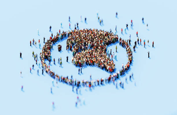istock Human Crowd Forming World Symbol On Blue Background 1872237495