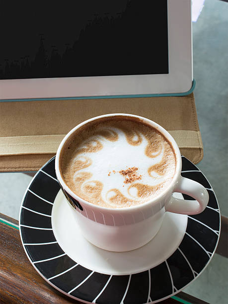 istock Cup of coffee with a tablet aside 187223986