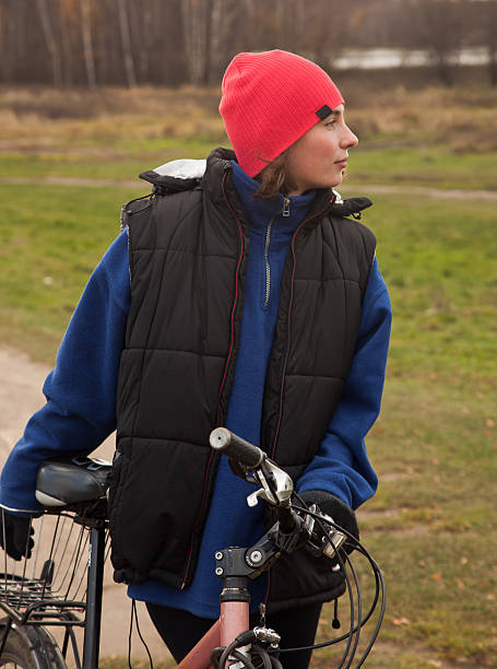 istock girl with a bicycle 187224836