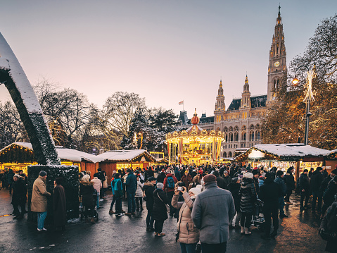 People on the town square in front of Vienna Town Hall at time of the Christmas market named Wiener Christkindlmarkt