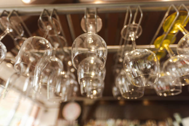 istock Wine Glasses Hanging at Bar 1872254199