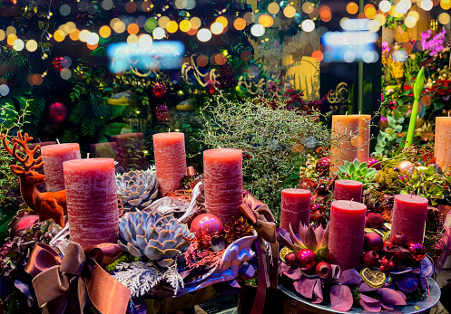 Decorative in Christmas holiday with Christmas candles and lights. Christmas background.