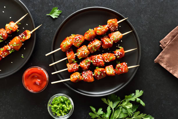 istock Teriyaki chicken skewers on plate 1872270883