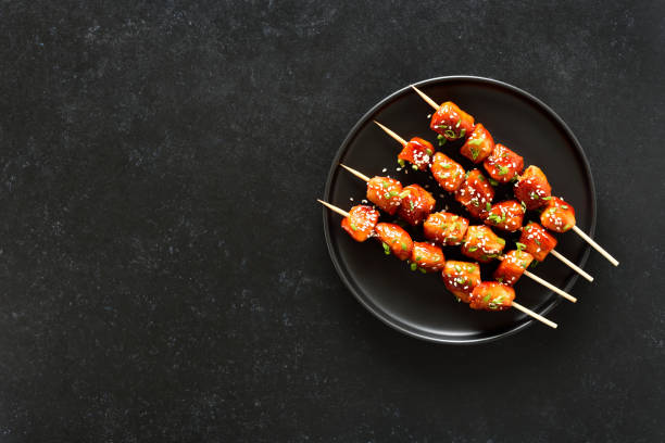 istock Teriyaki chicken skewers on plate 1872270886