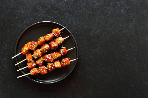 istock Teriyaki chicken skewers on plate 1872270893