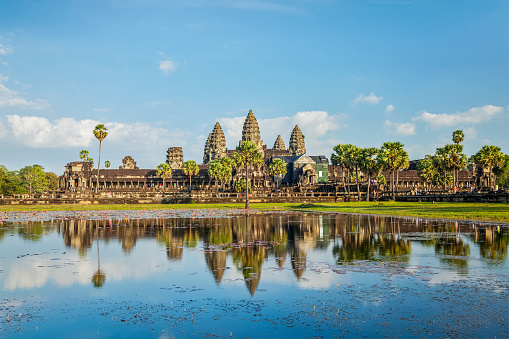 Famous Cambodian landmark and tourist attraction Angkor Wat with reflection in water. Cambodia, Siem Reap