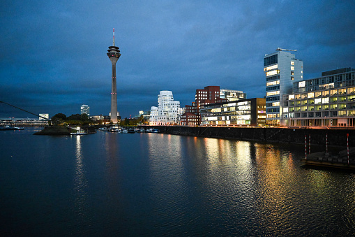 Duesseldorf, Germany, November 6, 2023 - Rhine Tower and Gehry buildings in Duesseldorf's Media Harbor.