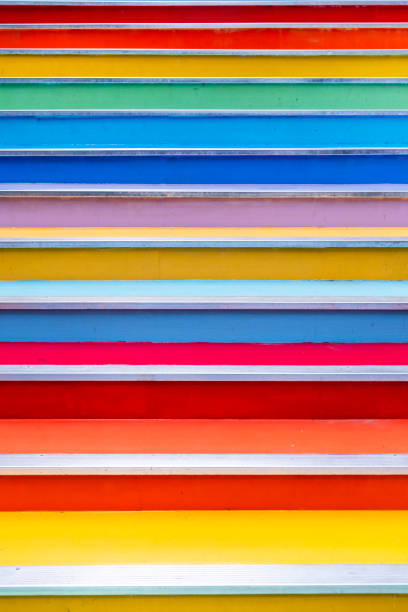 Stairs painted in rainbow colors background