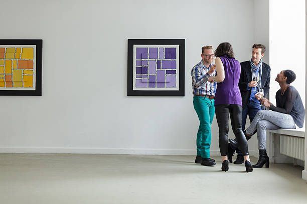 istock Group of young people at Art opening 187229753