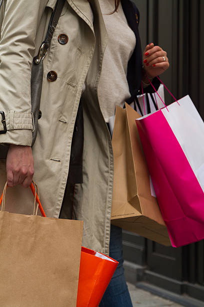 istock Woman with shopping bag in the hands 187230213