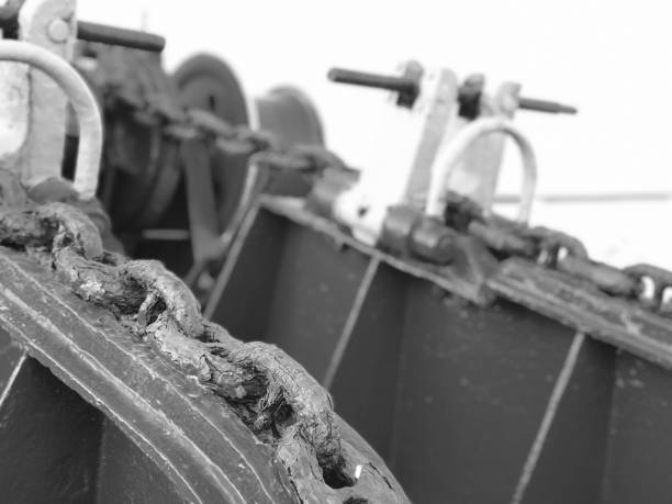 Rusted view of the anchor chain of a ship at sea