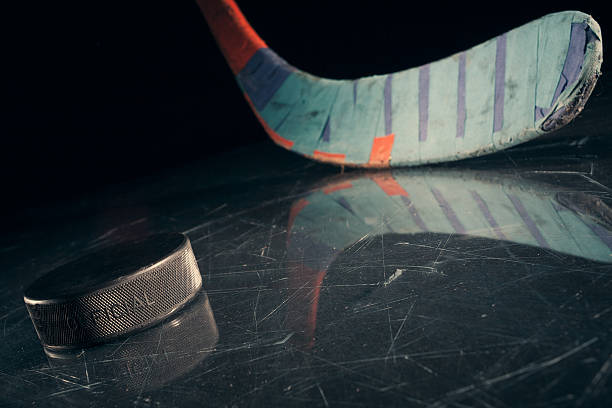 istock Hockey stick and puck 187230957
