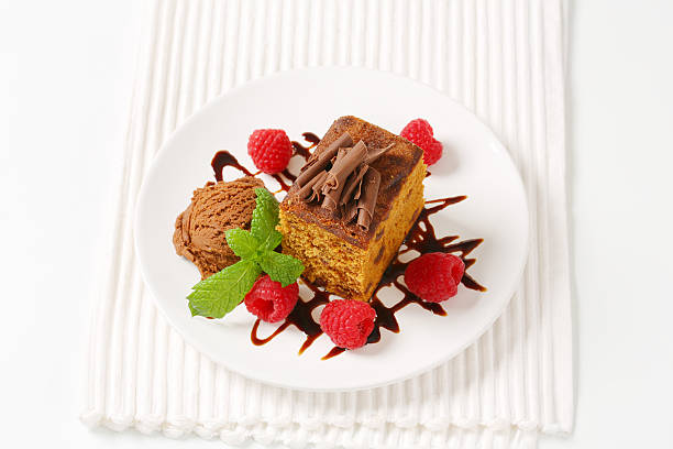 istock gingerbread cake, ice cream and raspberries 187231054