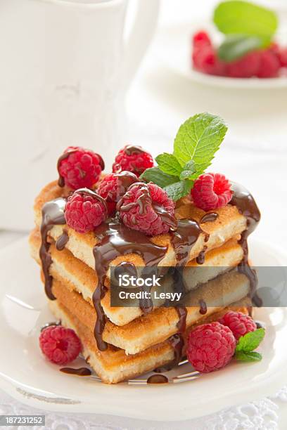 Waffles With Raspberry Honey And Chocolate Stock Photo - Download Image Now - Belgian Waffle, Berry Fruit, Breakfast