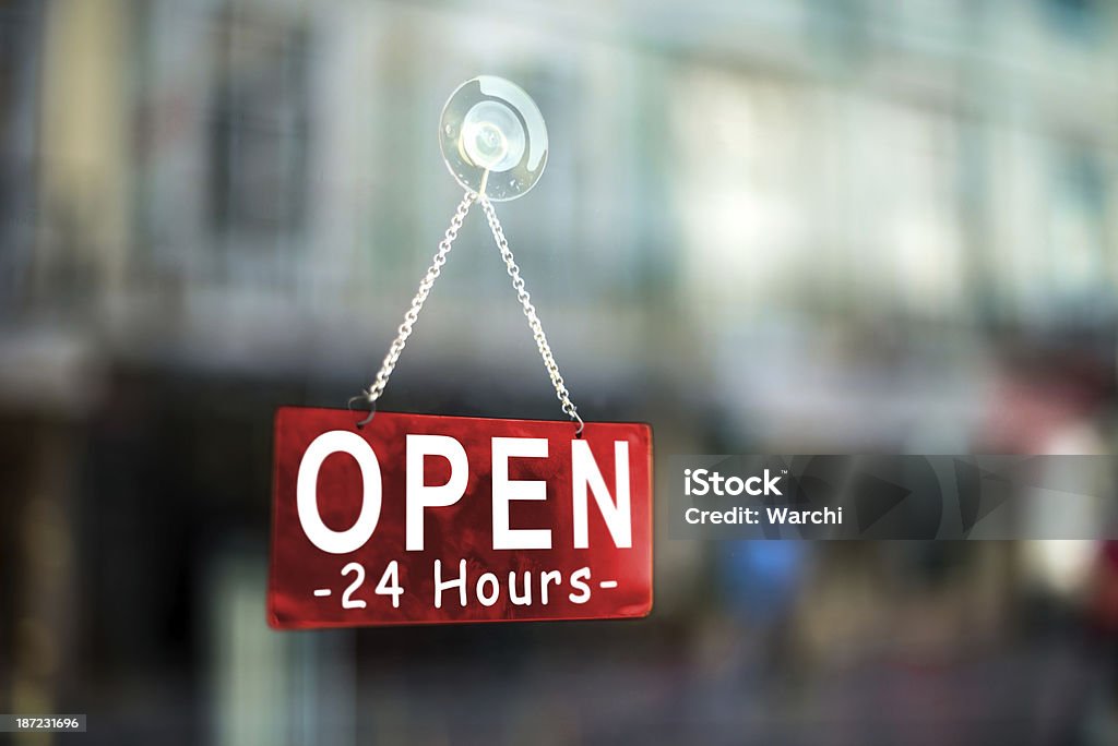 open 24 hours open 24 hours  sign on storefront 24 Hrs Stock Photo