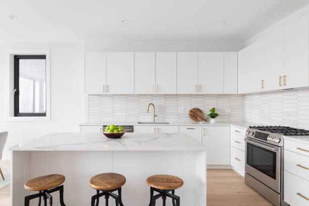 istock A white kitchen detail with a brown picket tile backsplash. 1872317887