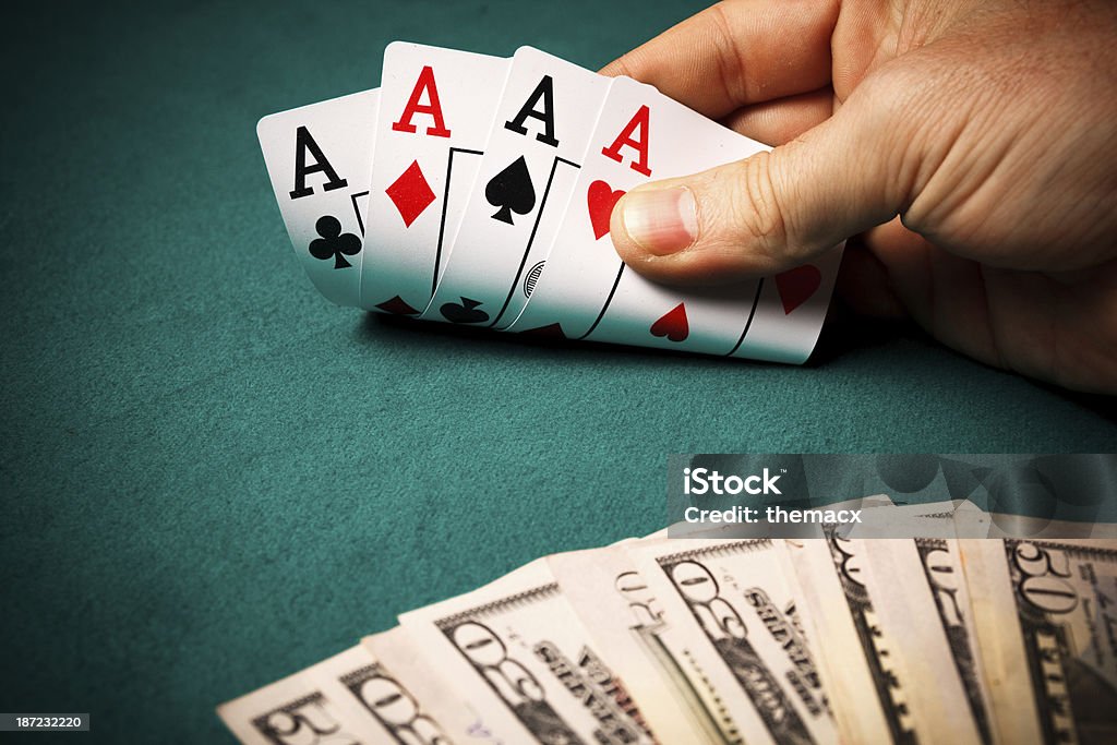 Hand of aces and dollar Hand of aces and dollar. Ace Stock Photo