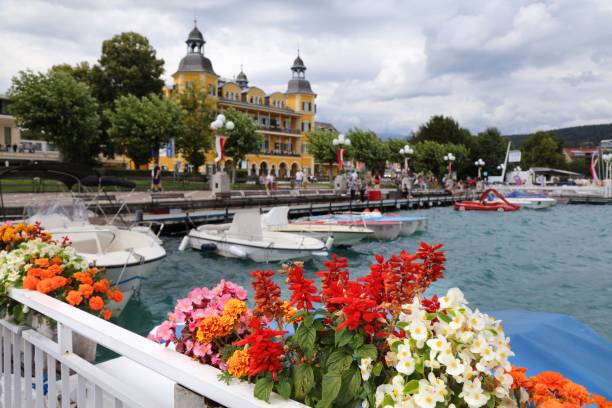 Town flowers in Velden am Worther See in Austria. Mixed species flower pot with marigold, Salvia splendens (scarlet sage) and begonia.