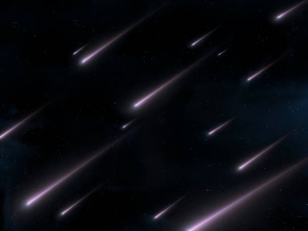 istock Meteor stream on a black background. Star rain in the night sky. 1872336723