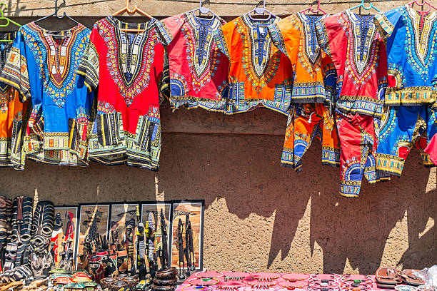 African Curios and clothing African Curios and clothing hanging on the wall. soweto stock pictures, royalty-free photos & images