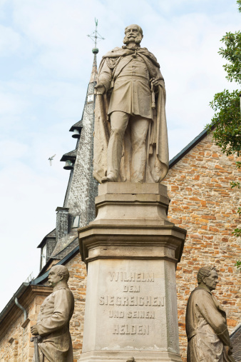 Emperor Wilhelm I and Bismarck and Moltke. Monument and memorial in Essen Kettwig, made in 1889 by Wilhelm Albermann. In background is church Marin Luther.