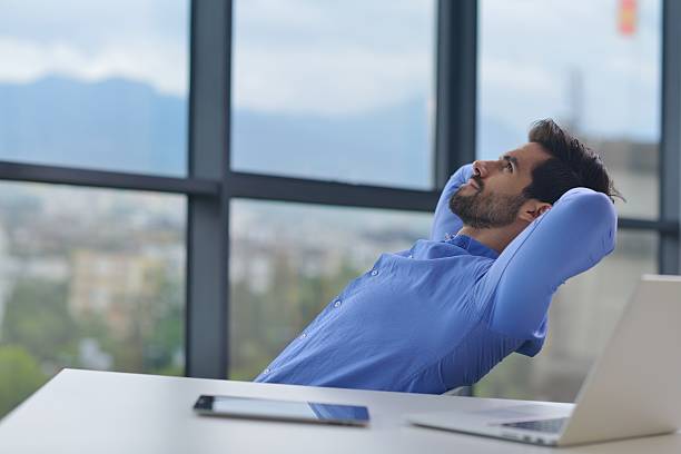 istock happy young business man at office 187234051