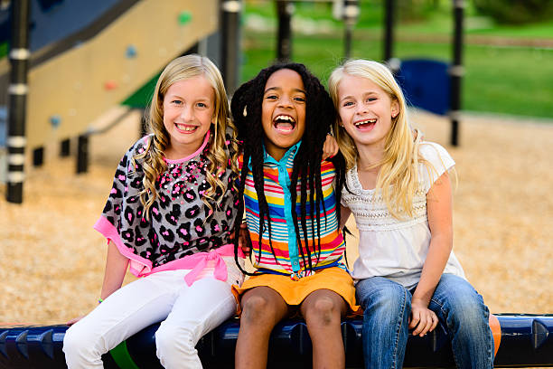 istock Multi Ethnic Girls Laughing Together 187235372