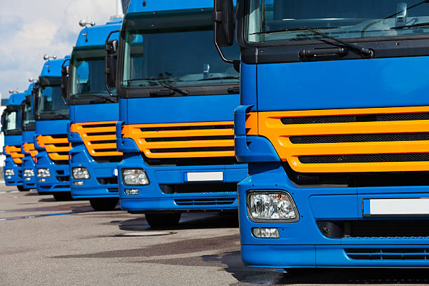 istock Semi trucks in a row 187235858