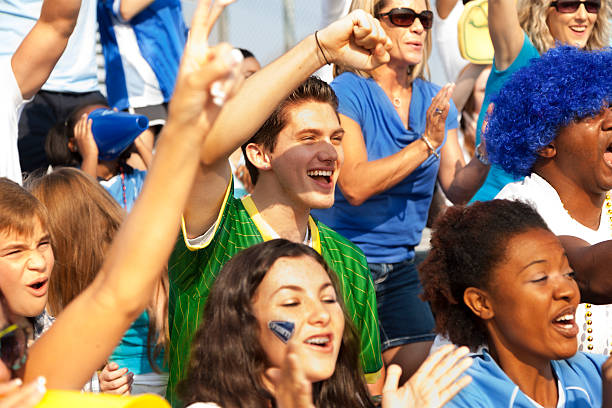 istock Sports: Fans cheer for their team during local sporting event. 187236853