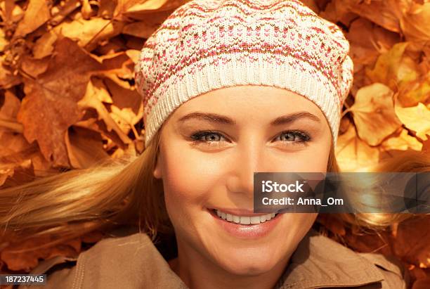 Smiling Lady Lay On The Ground Stock Photo - Download Image Now - Adult, Adults Only, Autumn