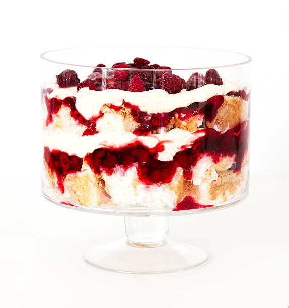 Trifle Raspberry and Cranberry Trifle for Christmas on white background trifle stock pictures, royalty-free photos & images