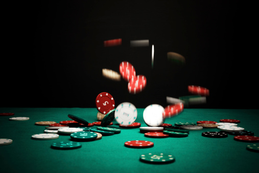 Poker Chips Falling on the table.