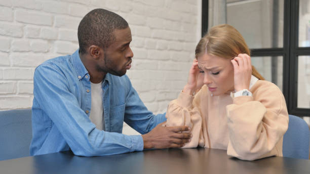 istock African Man Consolidate Crying Sad Woman 1872377016