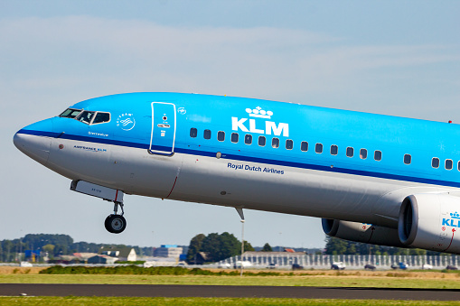 Boeing 737 pasenger plane from KLM Royal Dutch Airlines taking off from Amsterdam-Schiphol Airport. Amsterdam, The Netherlands - August 17, 2016