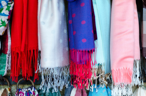 Silk textiles, indian sari head scarfs in market place