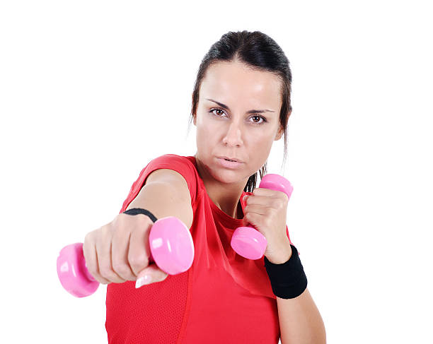 istock Attractive female athlete doing workout exercises on isolated white background 187240171