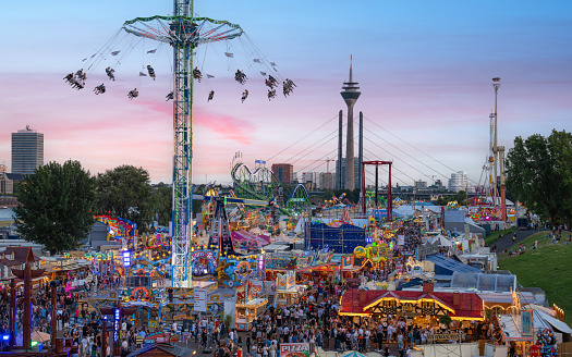 Düsseldorf, Germany - July 18, 2023: Panoramic image of Rhine funfair of Dusseldorf on July 18, 2023 in Germany, Europe