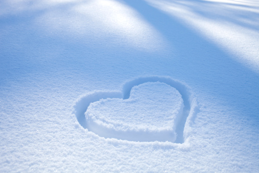 Heart drawn on snow.