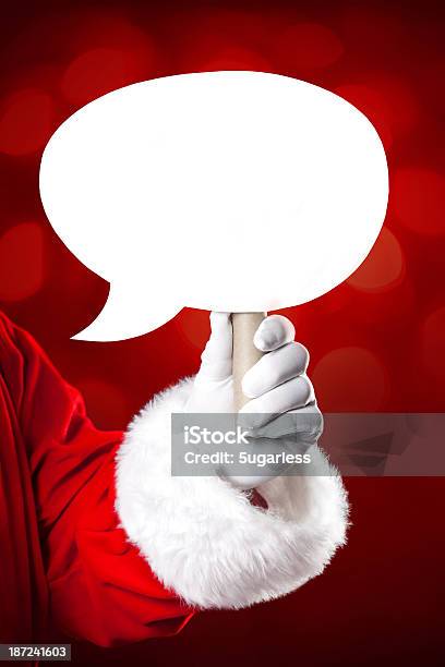 Santa Claus Holding Discurso Burbujas En Su Mano Foto de stock y más banco de imágenes de Adulto - Adulto, Agarrar, Blanco - Color