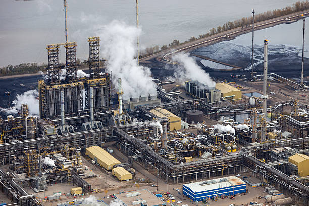 Oil Refinery, Aerial Photo Close-up aerial photo of an oil refinery in the Alberta Oilsands, near Fort McMurray. oilsands stock pictures, royalty-free photos & images