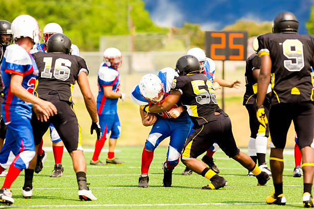 istock Sports:  Football running back makes a play. 187242737