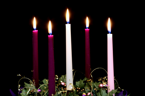 Christmas Advent candles representing the story of Christ.