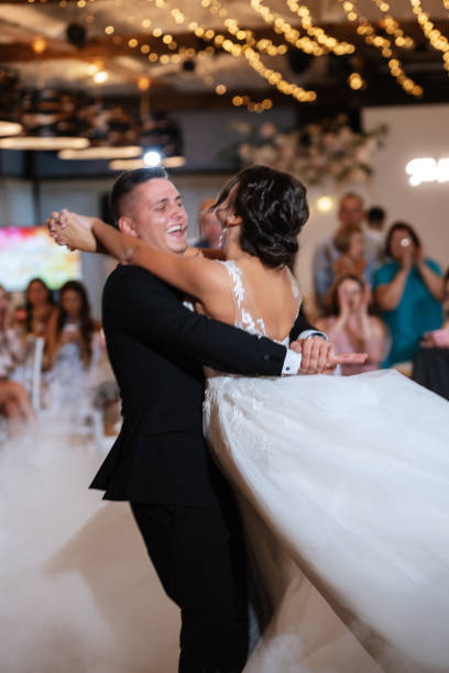 istock the first dance of the bride and groom inside a restaurant 1872447190
