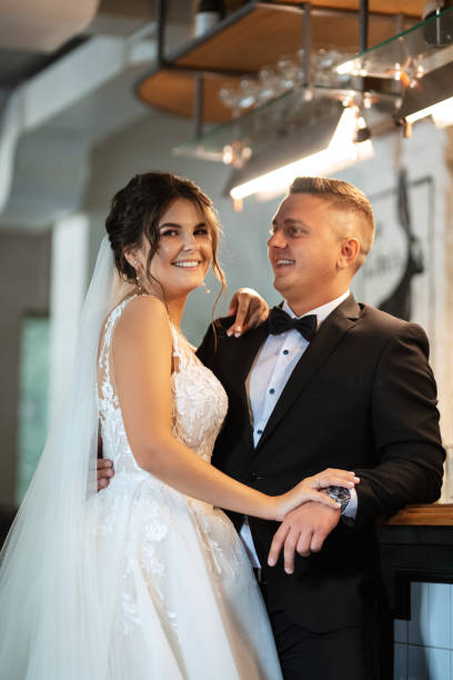 istock bride and groom inside a cocktail bar 1872452717