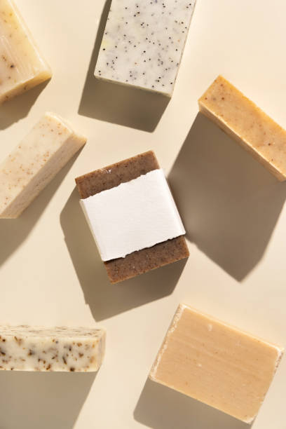 istock Beige and brown soap bars on light beige top view, hard shadows, packaging mockup 1872456861