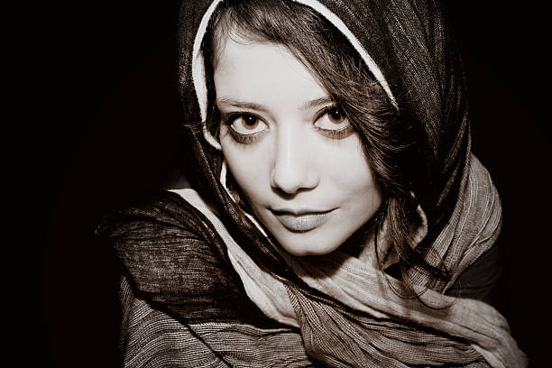 istock woman portrait and headscarf 187245878
