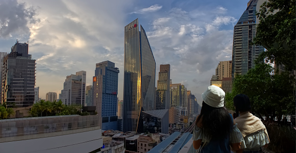 October 13, 2023, Cityscape of skyscrapers with clouds and sky in Asoke Montri intersection Sukhumvit road Bangkok Thailand