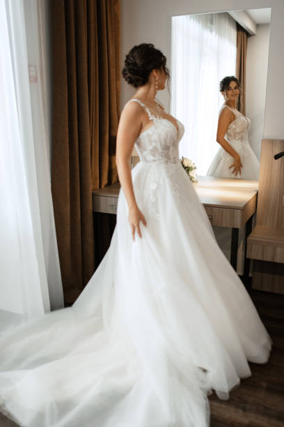 istock bride in a white dress at the training camp 1872464378