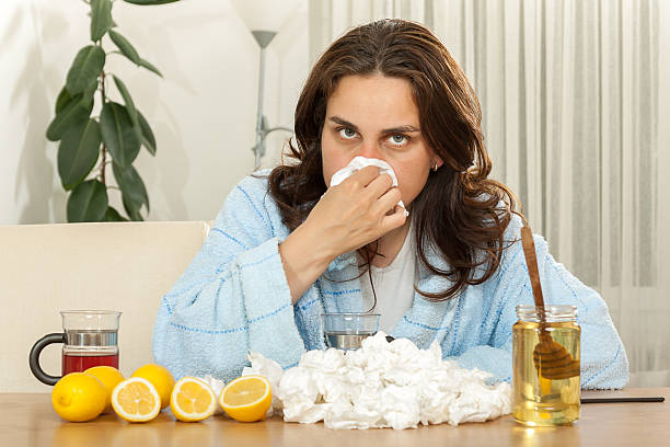 istock Mother and daughter with cold or flu 187246446